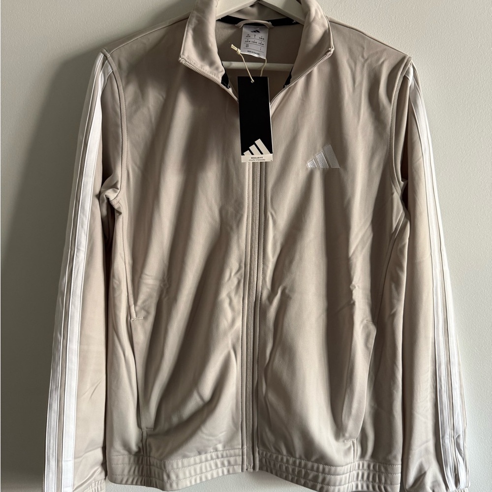 Adidas women’s Beige Tracksuit Jacket with two side zipper pockets